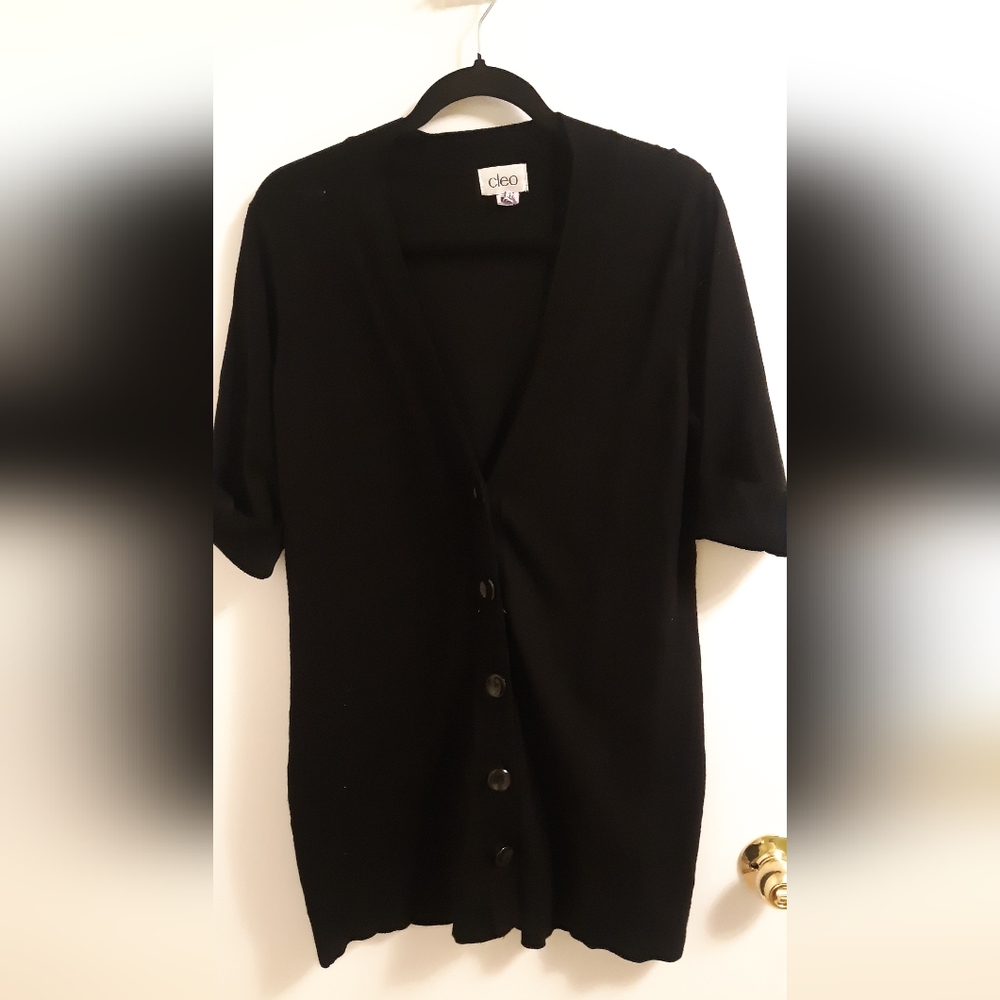 Womans black 3/4 length cardigan. Short sleeves.. buttons down the front